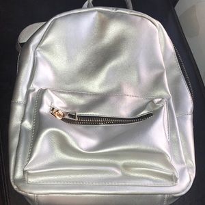 Cute small silver backpack